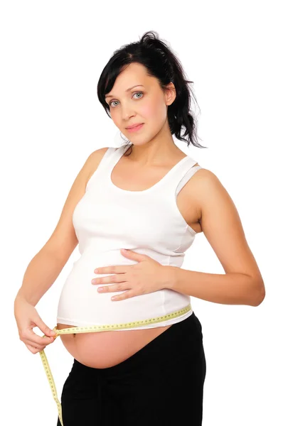 Young Pregnant Mom Measure Her Belly White Background — Stock Photo, Image