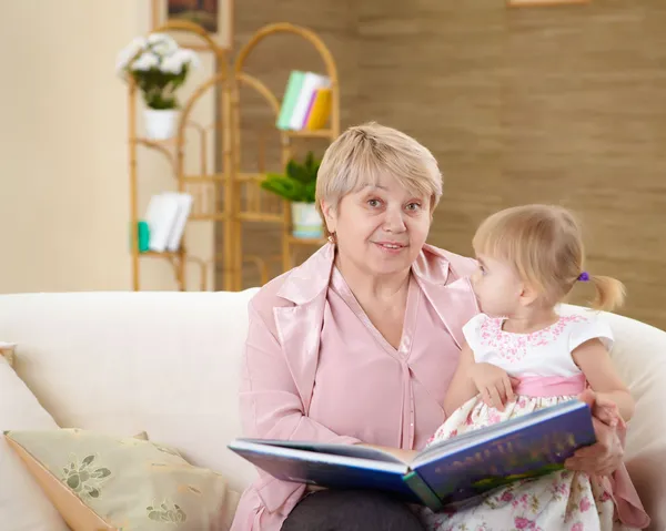 Grandmother Reading Book Her Granddaghter Home — Stock Photo, Image