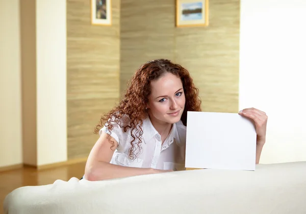 stock image Portrait of woman holding blank card