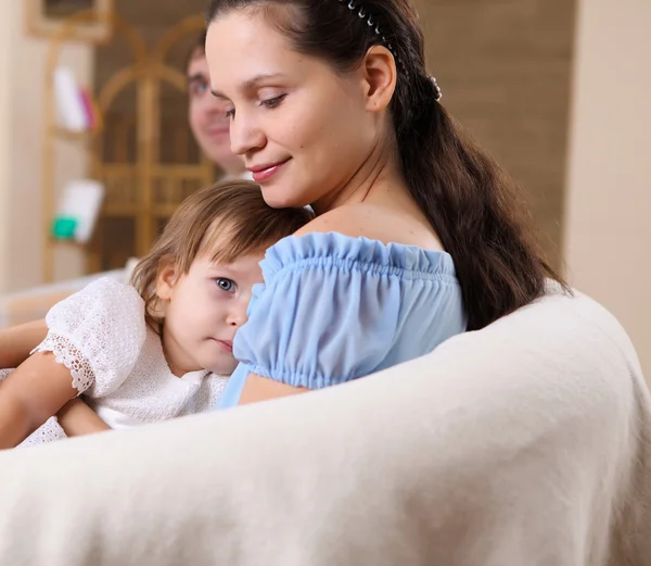 Young mother with a daughter at home — Stock Photo, Image