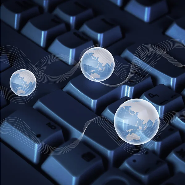 グローバル ネットワークのシンボルとしてのコンピューターのキーボードの画像 — ストック写真