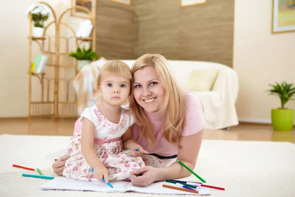 Mother with her little daughter at home — Stock Photo, Image
