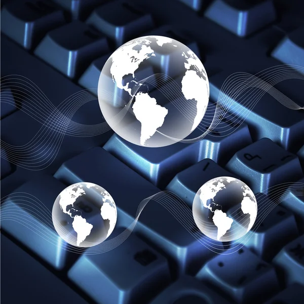 グローバル ネットワークのシンボルとしてのコンピューターのキーボードの画像 — ストック写真