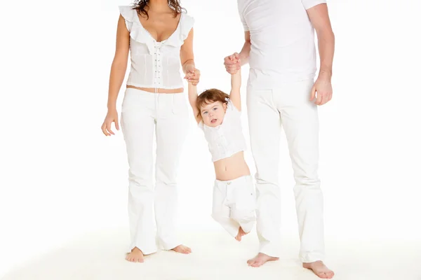 Mother, father and their child together in studio — Stock Photo, Image