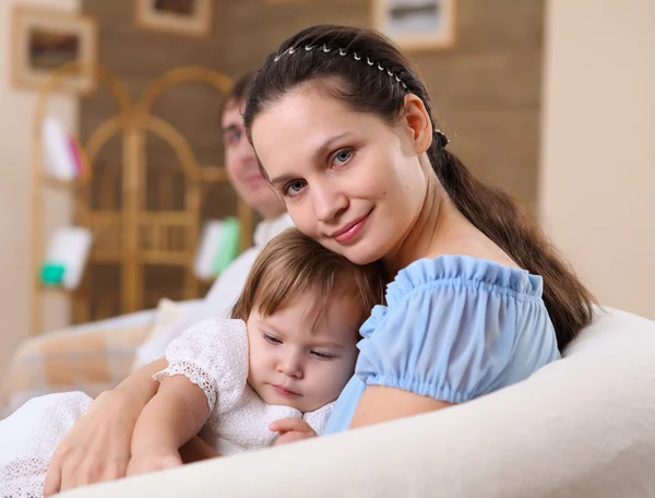Young mother with a daughter at home — Stock Photo, Image