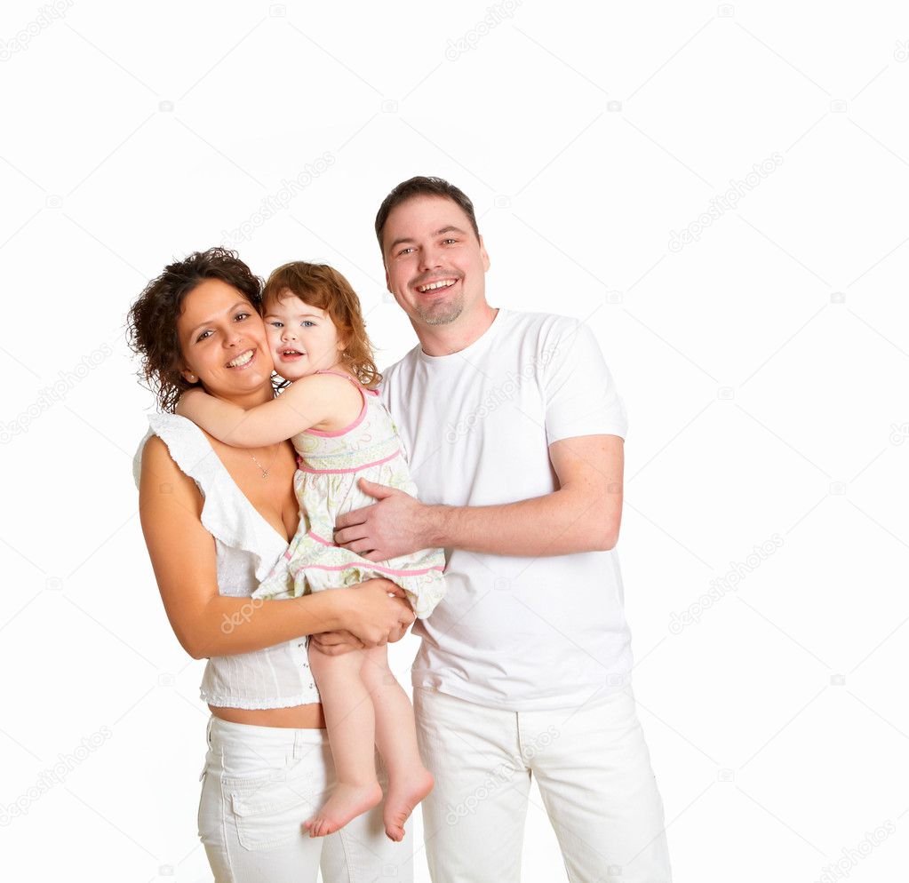 Mother, father and their child together in studio