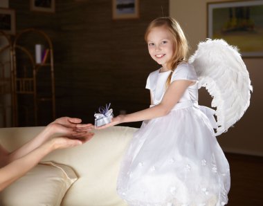 Girl in white dressed as an angel clipart