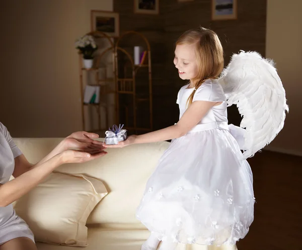 Girl in white dressed as an angel — Stock Photo, Image