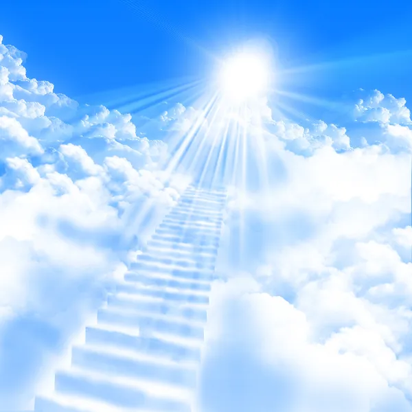 stock image A ladder directed up to blue cloudy skies and sun