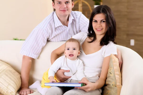 Young family at home playing with a baby — Stock Photo, Image