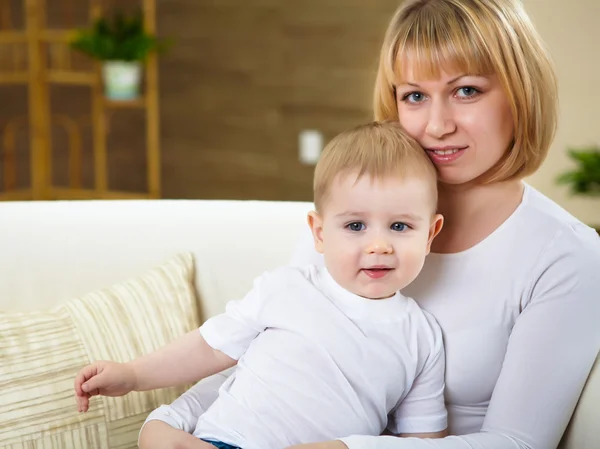 Little boy and his mother at home together — Stock Photo, Image