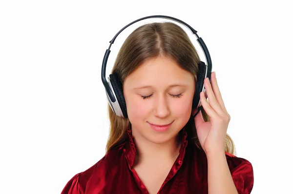 Ein Teenager-Mädchen im Studio mit Kopfhörern — Stockfoto