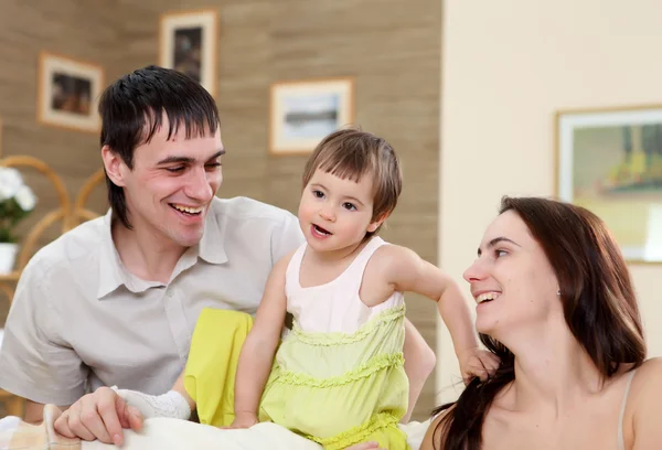 Young parents with a little daughtel — Stock Photo, Image