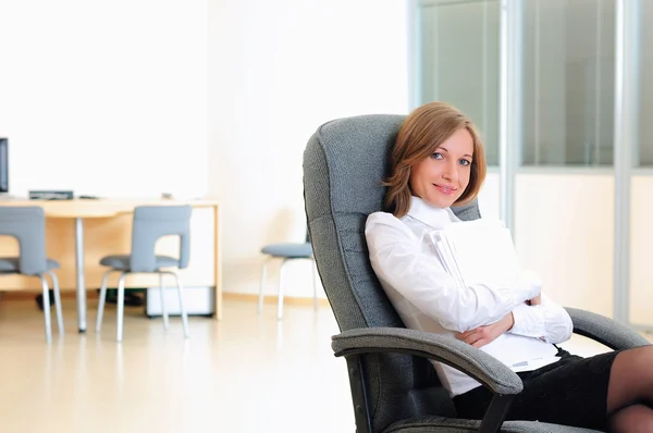 Young girl in his office — Stock Photo, Image