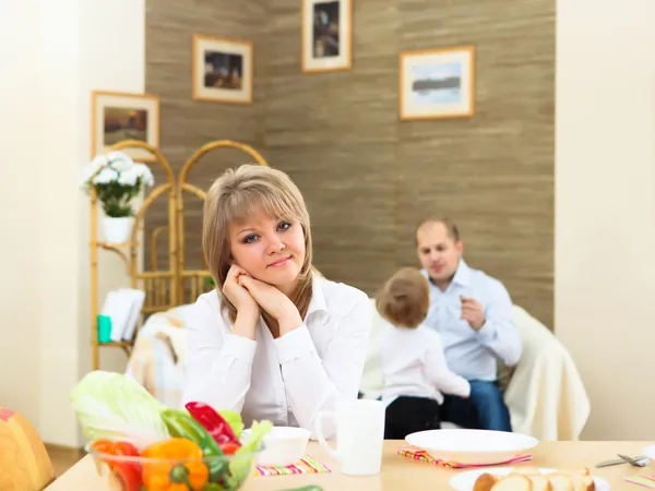 stock image Young woman having meal at home