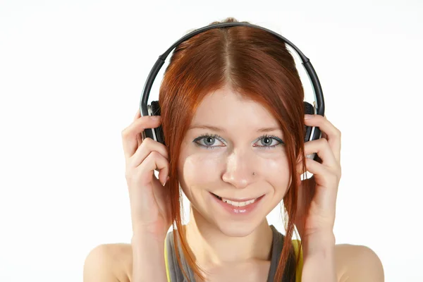 Μια έφηβη σε στούντιο με ακουστικά — Φωτογραφία Αρχείου
