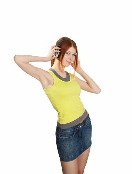 Ein Teenager Mädchen Roten Hemd Das Mit Kopfhörern Musik Hört — Stockfoto