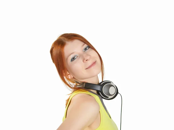 Dospívající dívka ve studiu se sluchátky — Stock fotografie