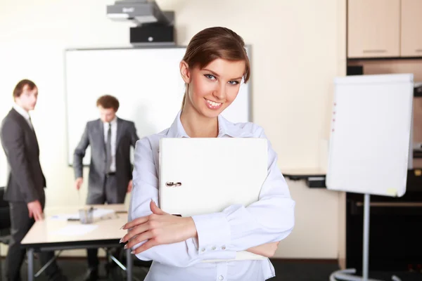 A young business woman in office — Stock Photo, Image