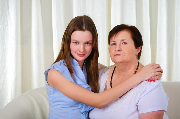 A grandmother with her young granddaughter — Stock Photo, Image