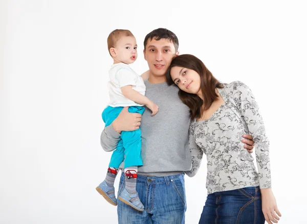 Moeder, vader en hun kind samen in de studio — Stockfoto