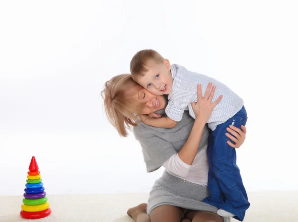 Mãe e filho em casa — Fotografia de Stock