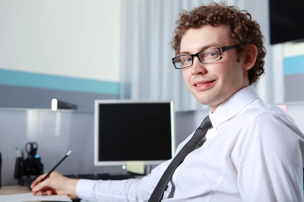 A young businessman in office — Stock Photo, Image