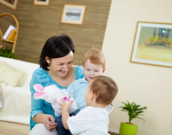 Mother and son at home on the floor — Stock Photo, Image