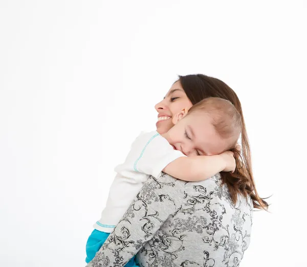 Giovane madre divertirsi con il suo piccolo figlio — Foto Stock