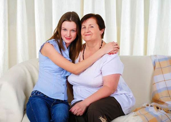 A grandmother with her young granddaughter — Stock Photo, Image