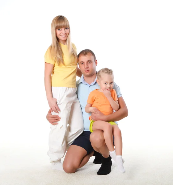 Familie mit kleiner Tochter beim gemeinsamen Sport — Stockfoto