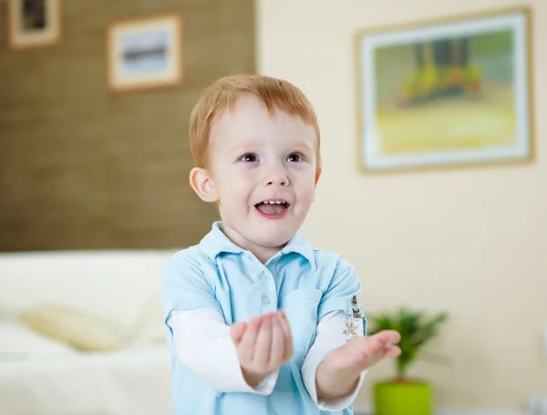Happy smiling and laughing boy at home — Stock Photo, Image