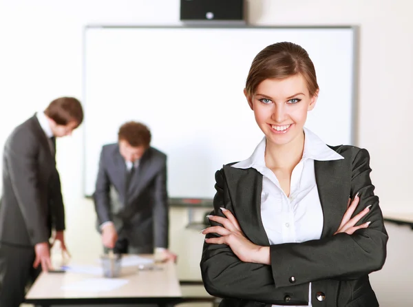 Young business woman in office — Stock Photo, Image