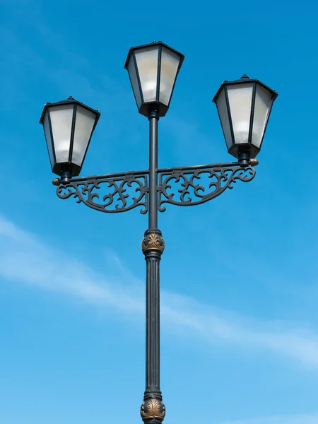 stock image Street lamp against the blue sky