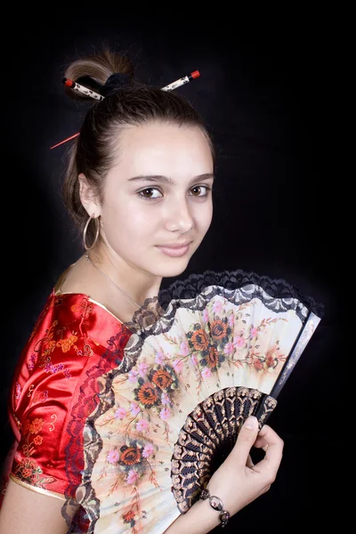 Girl with fan. Chinese styled. — стокове фото