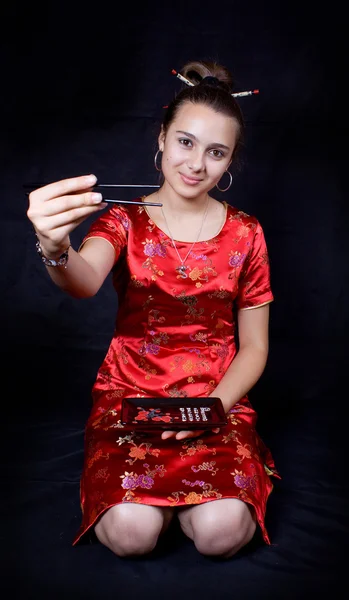 Junge Frau in Rot. chinesisch gestylt. — Stockfoto