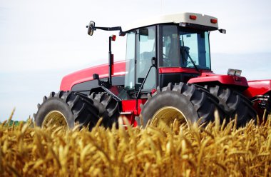 Tractor in field clipart