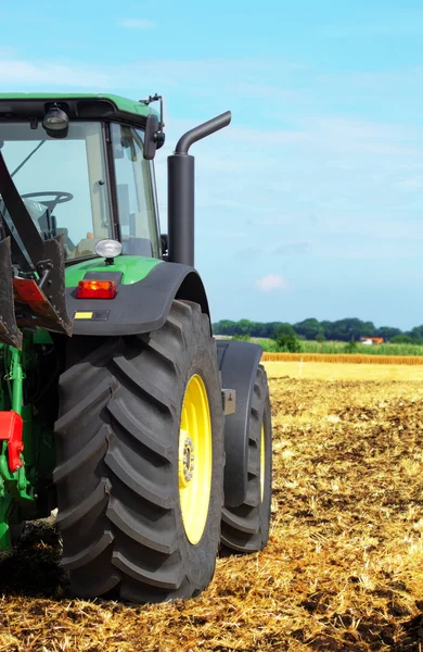 Tractor in a field — Stock Photo, Image