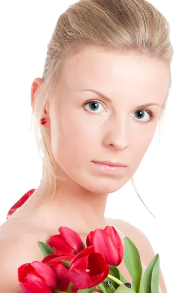 stock image Young woman with bunch of tulips