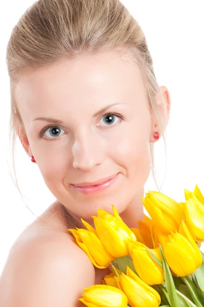 Młoda kobieta z grono tulipany — Zdjęcie stockowe