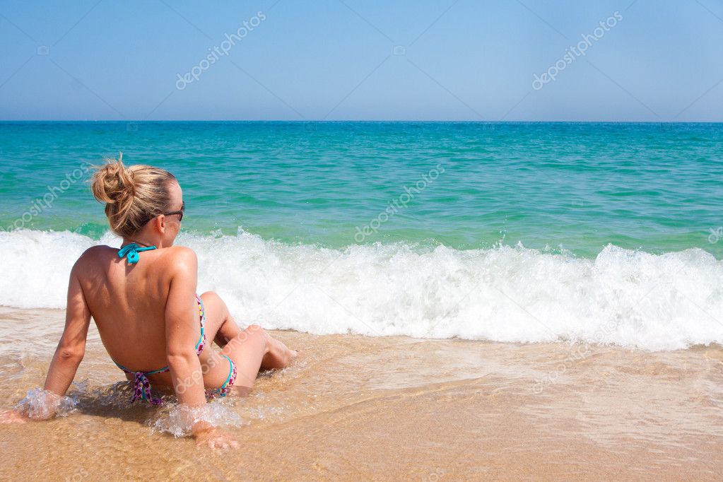 Woman and ocean waves