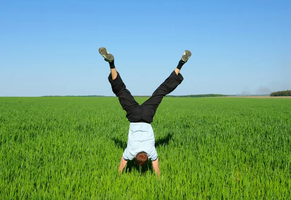 Man on a green meadow — Stock Photo, Image