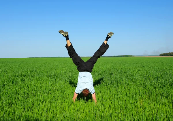 Man on a green meadow — Stock Photo, Image