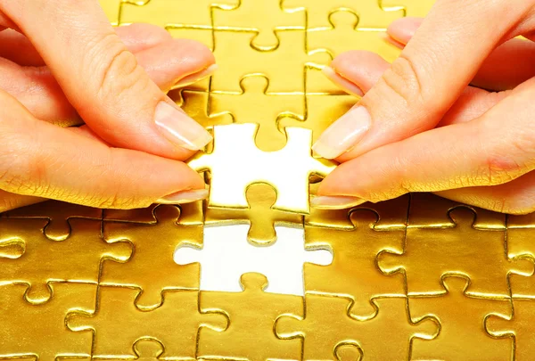 Gold puzzle — Stock Photo, Image