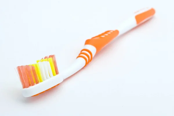 Цветная зубная щетка — стоковое фото
