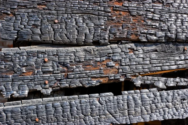 stock image Burned wooden wall