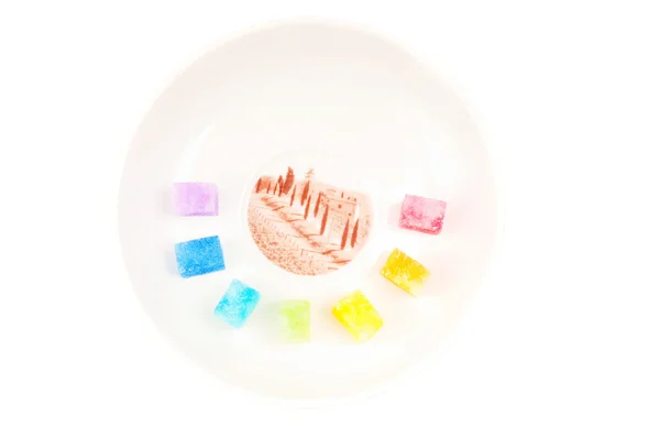 Многоцветный шугар на тарелке — стоковое фото