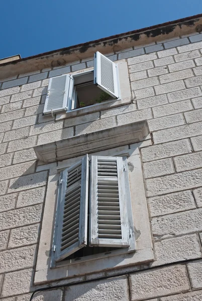 Two windows with shutters — Stock Photo, Image