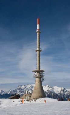 Television and radio tower on the mountain in Schladming. Austri clipart