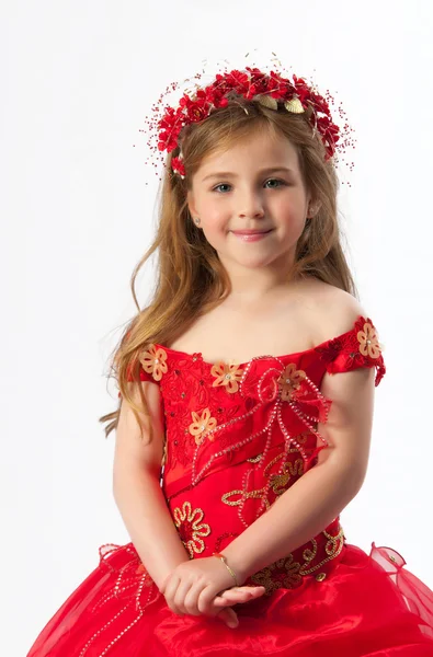 Een jong meisje in kostuum — Stockfoto